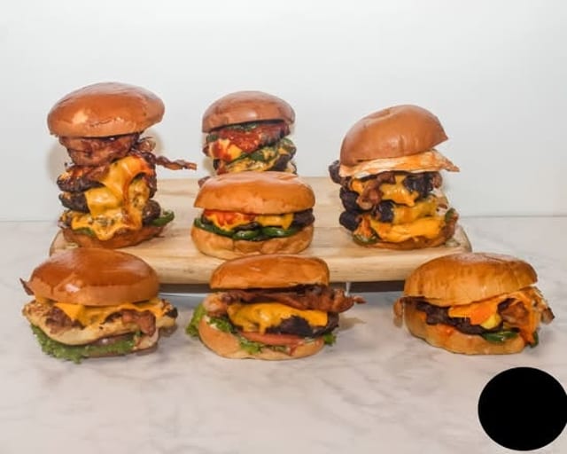 & Burger Feast ( 8 Single Burgers,25 Wings ,10 Tenders,2 Large Fries,4 Coleslaw).